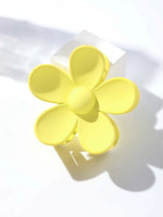 Pale yellow flower shaped claw clip