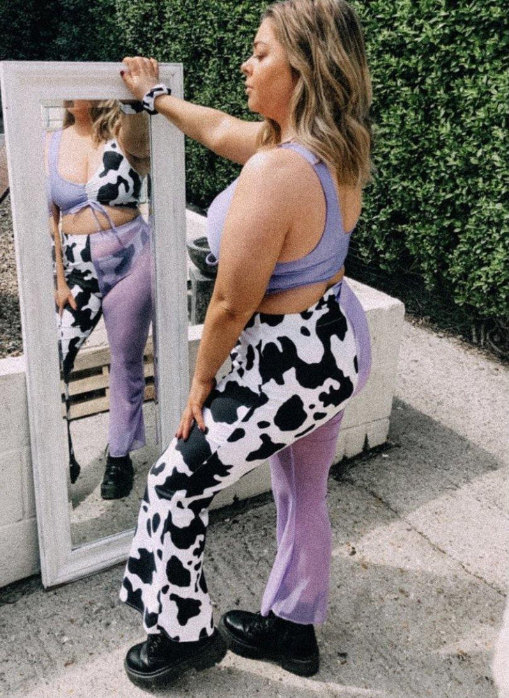 Cow print lycra and mesh half and half flares 